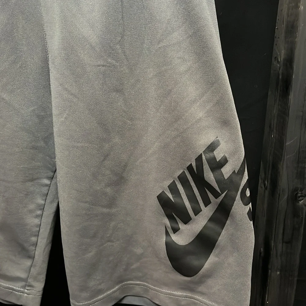 NIKE- medium gray polyester athletic shorts